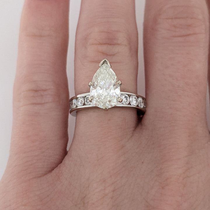 14K WHITE 2.39 CARAT TOTAL WEIGHT I1 K DIAMOND PEAR WITH (10) ROUND CHANNEL DIAMOND ESTATE RING 4.1 GRAMS