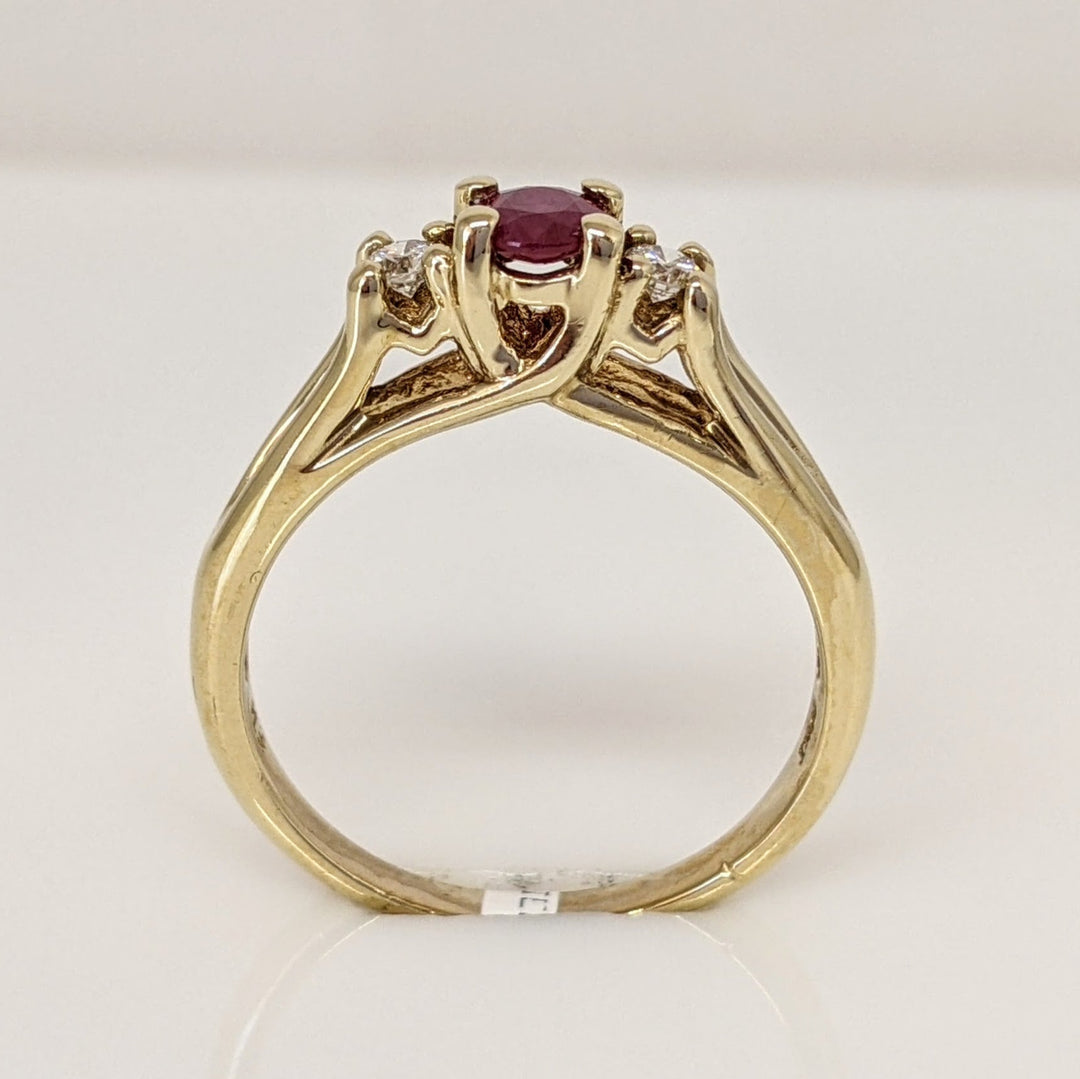 10K RUBY OVAL 4X6 "C" WITH .10 DIAMOND TOTAL WEIGHT (2) ESTATE RING 2.8 GRAMS