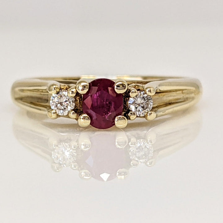 10K RUBY OVAL 4X6 "C" WITH .10 DIAMOND TOTAL WEIGHT (2) ESTATE RING 2.8 GRAMS