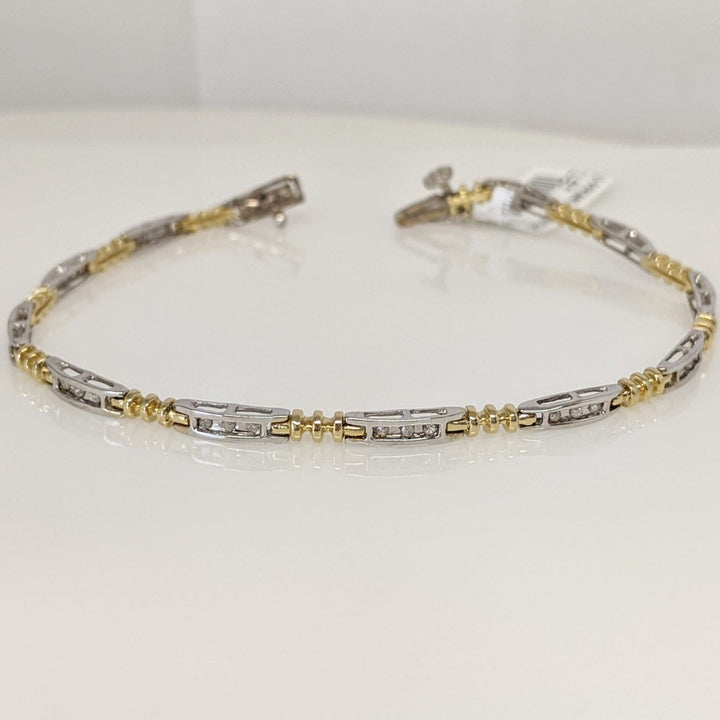 14K TWO-TONE .18 CARAT TOTAL WEIGHT DIAMOND ROUND PROMOTIONAL (36) ESTATE LINK BRACELET 6.6 GRAMS