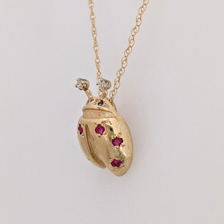 14K LADYBUG WITH (6) ROUND RUBY AND (2) MELEE ESTATE PENDANT & CHAIN 3.3 GRAMS