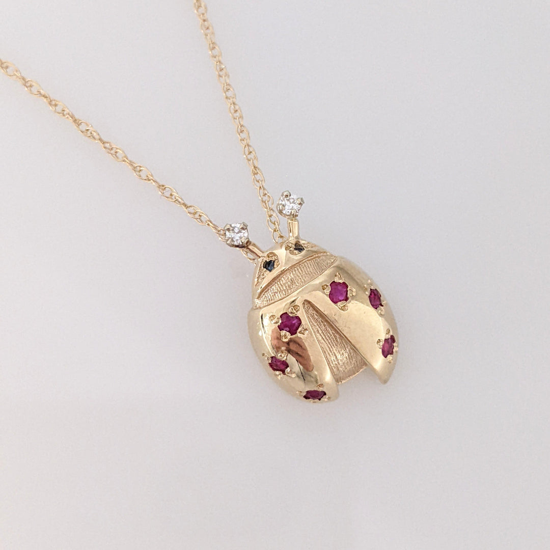 14K LADYBUG WITH (6) ROUND RUBY AND (2) MELEE ESTATE PENDANT & CHAIN 3.3 GRAMS