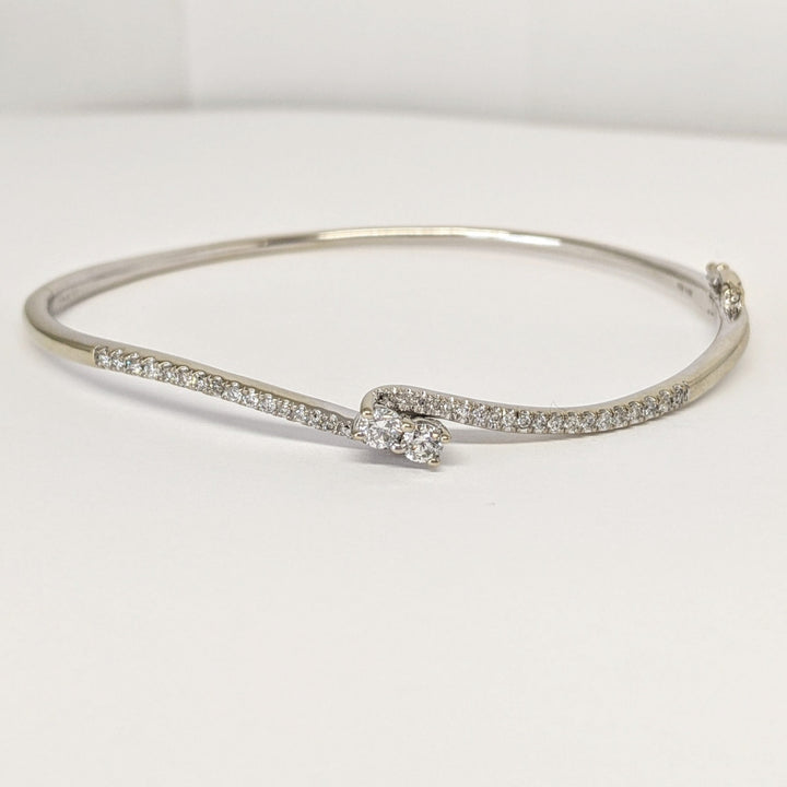 14K WHITE .79 CARAT TOTAL WEIGHT I1 I DIAMOND ROUND (44) BYPASS "EVER US" ESTATE BANGLE 10.8 GRAMS