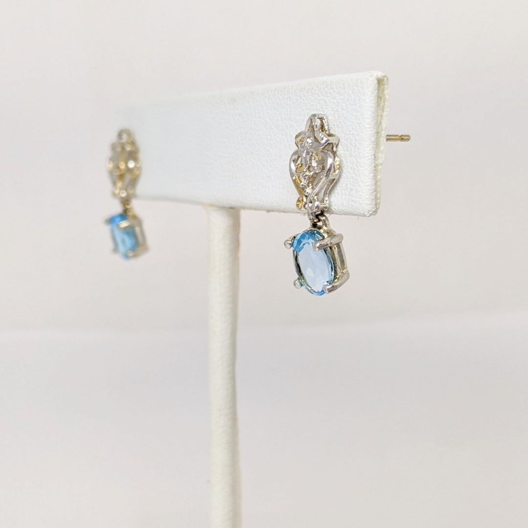 10K WHITE BLUE TOPAZ OVAL (2) 5X7 WITH (2) MELEE ESTATE DANGLE EARRINGS 2.1 GRAMS