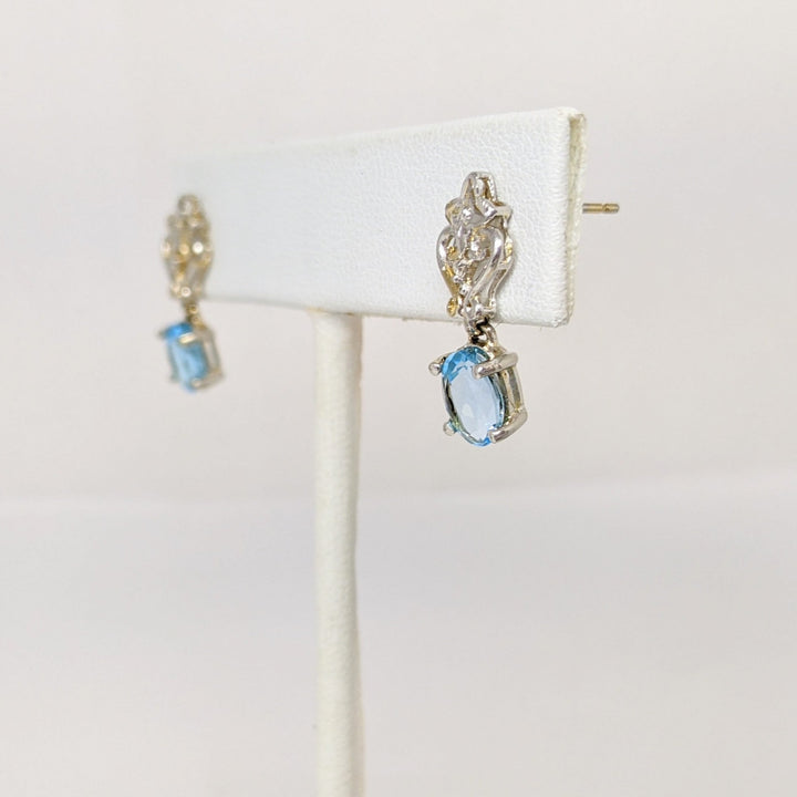 10K WHITE BLUE TOPAZ OVAL (2) 5X7 WITH (2) MELEE ESTATE DANGLE EARRINGS 2.1 GRAMS