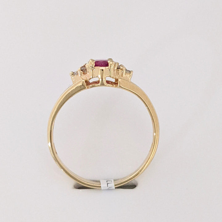 14K RUBY OVAL 4X6 WITH (6) MELEE ESTATE RING 2.5 GRAMS