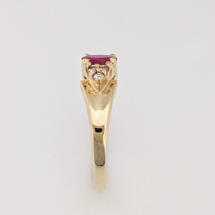 14K RUBY OVAL 4X6 WITH (6) MELEE ESTATE RING 2.5 GRAMS