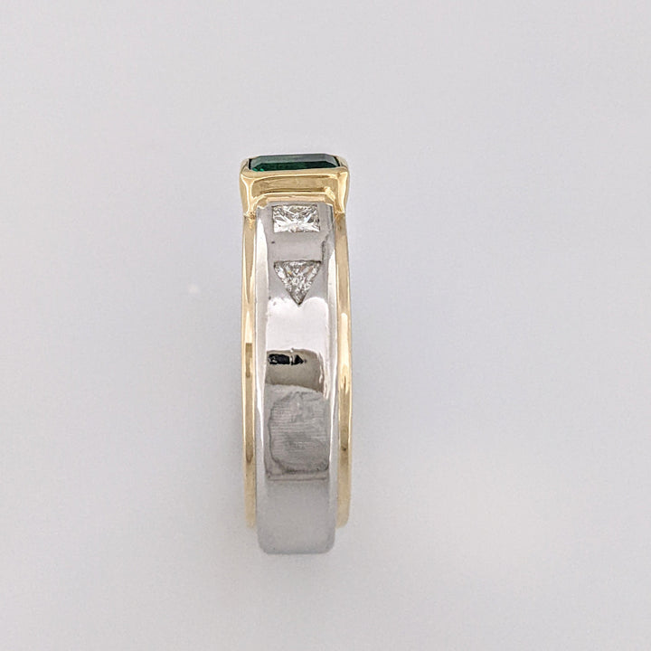 PLATINUM/18K EMERALD CUT EMERALD 4X6 WITH .54 DIAMOND TOTAL WEIGHT (2) PRINCESS CUT (2) TRILLION CUT ESTATE RING  15.8 GRAMS