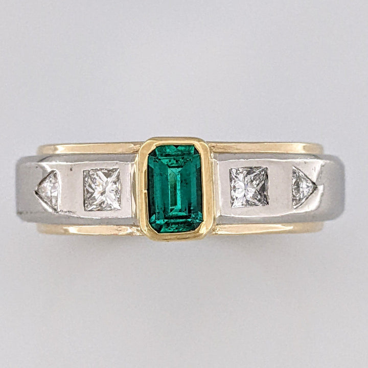 PLATINUM/18K EMERALD CUT EMERALD 4X6 WITH .54 DIAMOND TOTAL WEIGHT (2) PRINCESS CUT (2) TRILLION CUT ESTATE RING  15.8 GRAMS