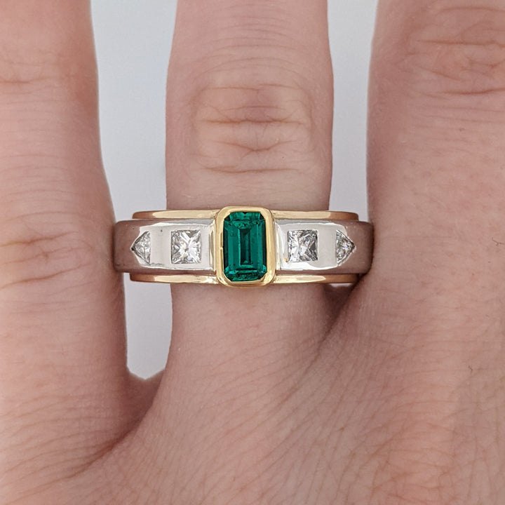 PLATINUM/18K EMERALD CUT EMERALD 4X6 WITH .54 DIAMOND TOTAL WEIGHT (2) PRINCESS CUT (2) TRILLION CUT ESTATE RING  15.8 GRAMS