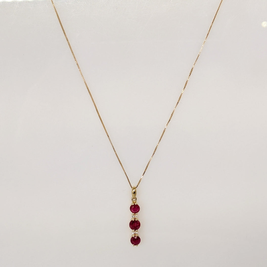 14K RUBY ROUND (1) 5.5MM (2) 4.5MM WITH (4) MELEE ESTATE PENDANT & CHAIN 2.6 GRAMS