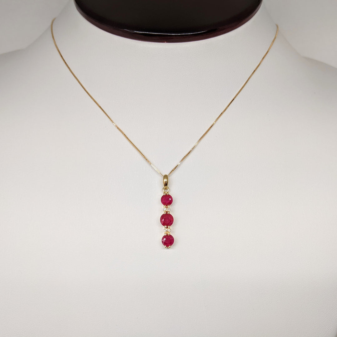 14K RUBY ROUND (1) 5.5MM (2) 4.5MM WITH (4) MELEE ESTATE PENDANT & CHAIN 2.6 GRAMS