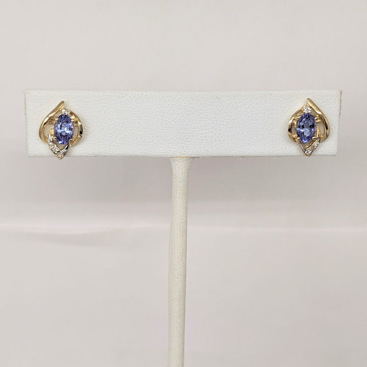 14K TANZANITE OVAL 4X6 (2) WITH (6) MELEE ESTATE EARRINGS 1.6 GRAMS