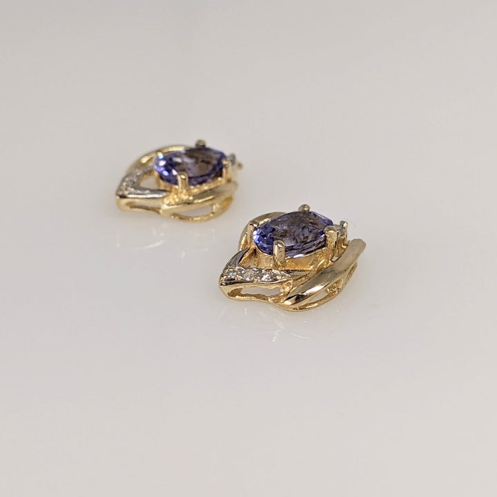 14K TANZANITE OVAL 4X6 (2) WITH (6) MELEE ESTATE EARRINGS 1.6 GRAMS