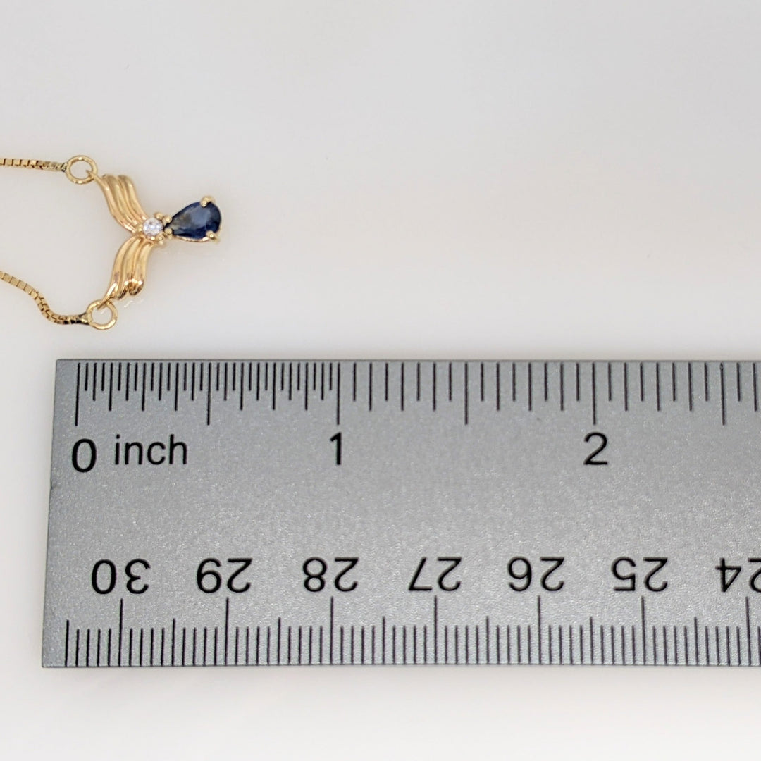 14K SAPPHIRE PEAR 3.75X5 WITH MELEE ESTATE V-NECKLACE 3.5 GRAMS