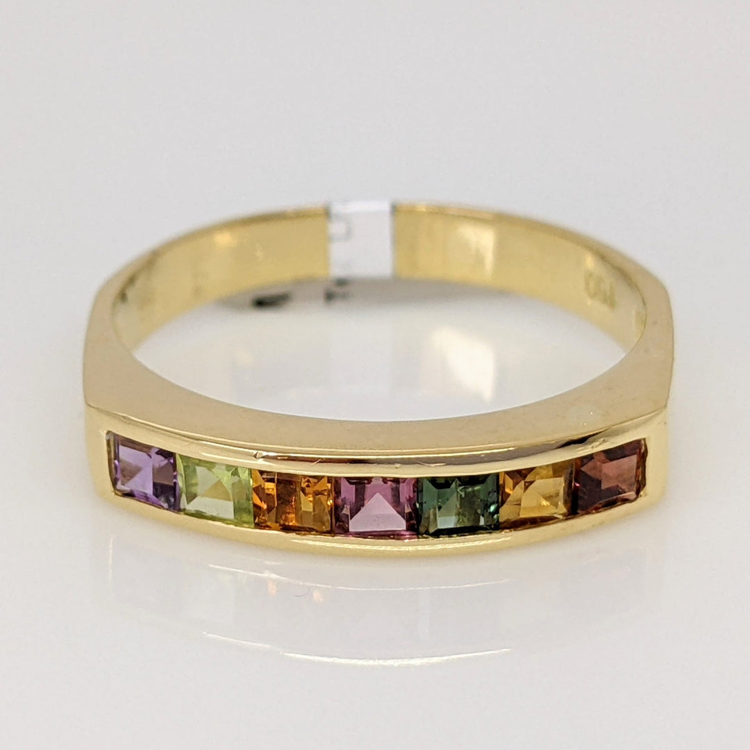 18K MULTI-COLORED PRINCESS CUT (7) 2MM ESTATE CHANNEL SET BAND 3.0 GRAMS