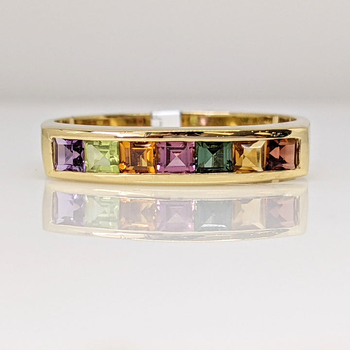 18K MULTI-COLORED PRINCESS CUT (7) 2MM ESTATE CHANNEL SET BAND 3.0 GRAMS