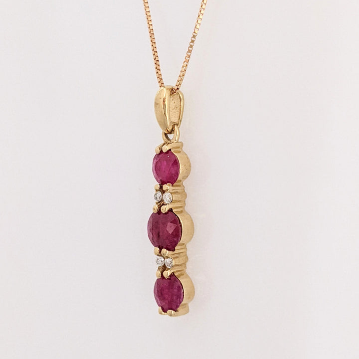 14K RUBY ROUND (1) 5.5MM (2) 4.5MM WITH (4) MELEE ESTATE PENDANT & CHAIN 2.6 GRAMS