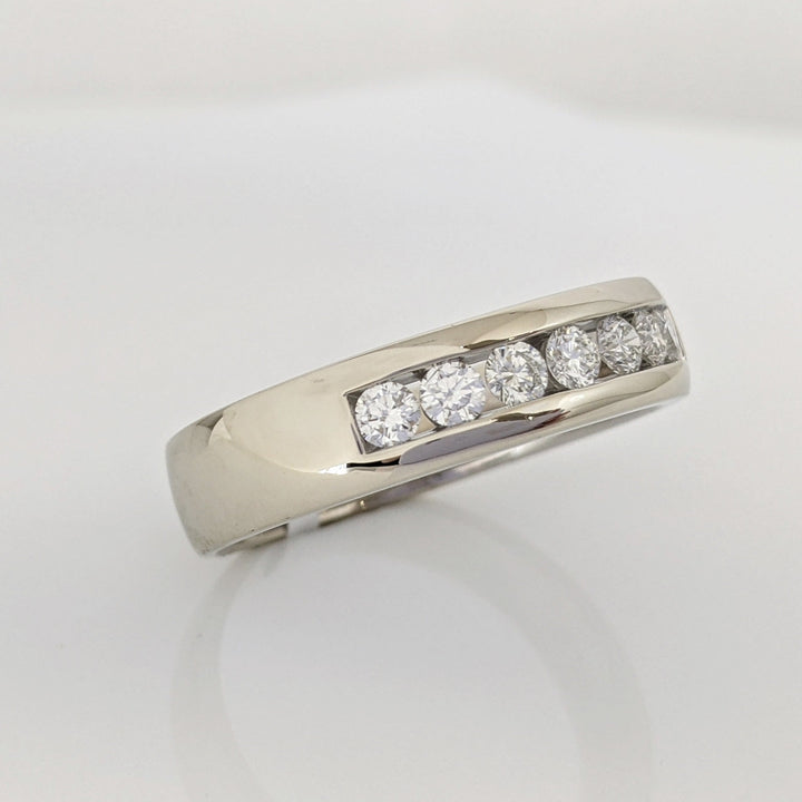 14K WHITE .62 CARAT TOTAL WEIGHT I1 I DIAMOND ROUND (7) ESTATE "LEO" CHANNEL-SET BAND 8.8 GRAMS