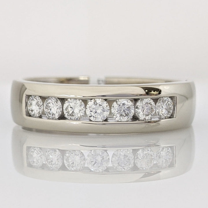 14K WHITE .62 CARAT TOTAL WEIGHT I1 I DIAMOND ROUND (7) ESTATE "LEO" CHANNEL-SET BAND 8.8 GRAMS