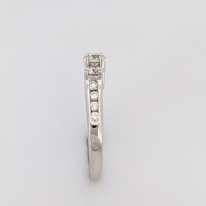 14K WHITE .87 CARAT TOTAL WEIGHT I1 G DIAMOND ROUND (11) ESTATE TRINITY RING 3.1 GRAMS