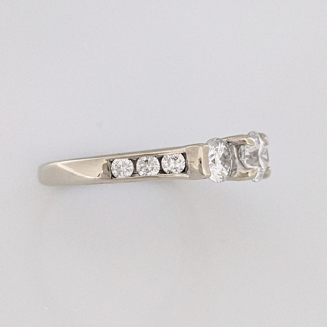 14K WHITE .87 CARAT TOTAL WEIGHT I1 G DIAMOND ROUND (11) ESTATE TRINITY RING 3.1 GRAMS