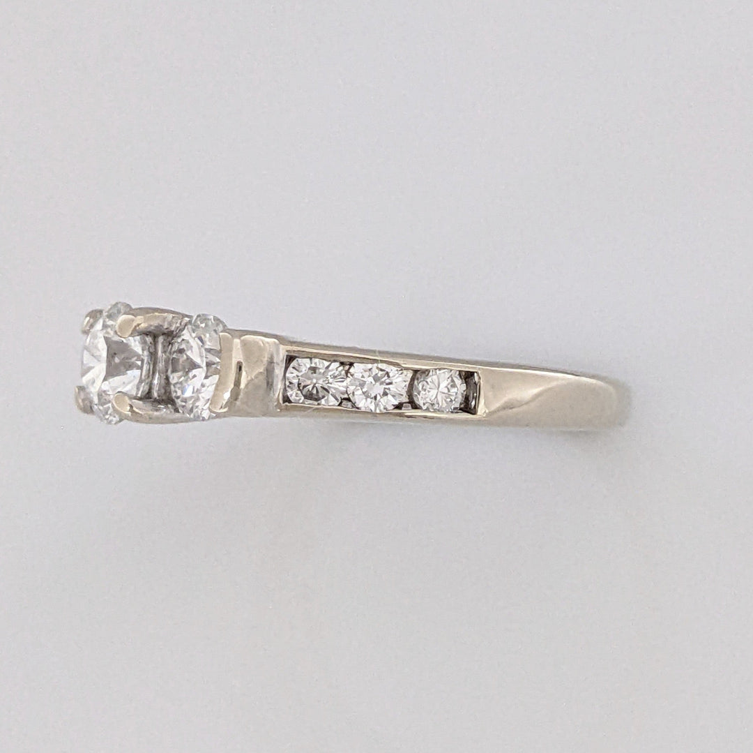 14K WHITE .87 CARAT TOTAL WEIGHT I1 G DIAMOND ROUND (11) ESTATE TRINITY RING 3.1 GRAMS