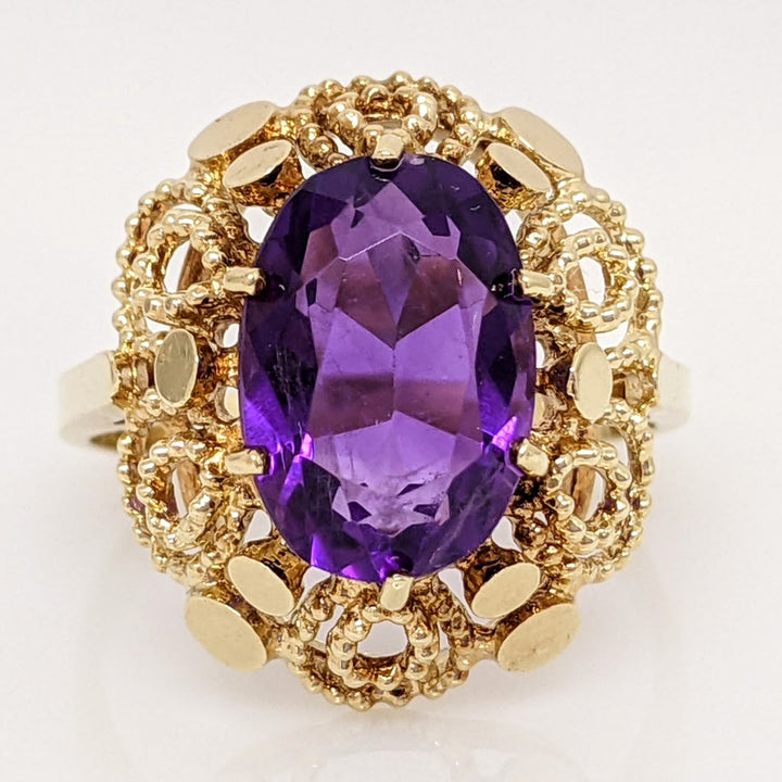 14K AMETHYST OVAL 8X12 BEADED OPEN TRIM ESTATE RING 4.8 GRAMS