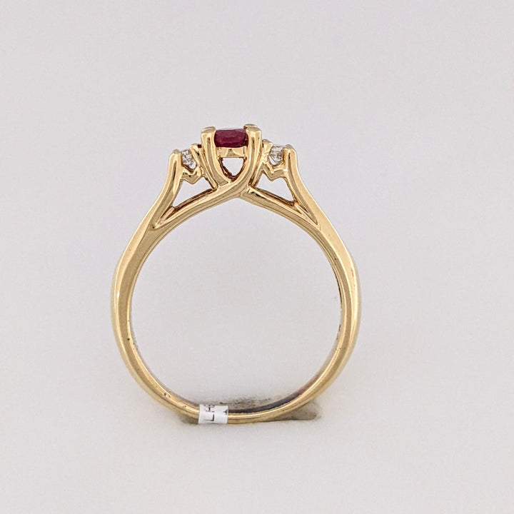 10K RUBY OVAL 4X6 "C" WITH .10 DIAMOND TOTAL WEIGHT (2) ESTATE RING 2.8 GRAMS