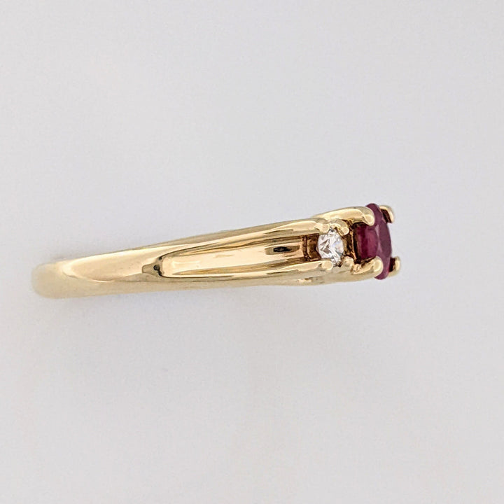 10K RUBY OVAL 4X6 "C" WITH .10 DIAMOND TOTAL WEIGHT (2) ESTATE RING 2.8 GRAMS