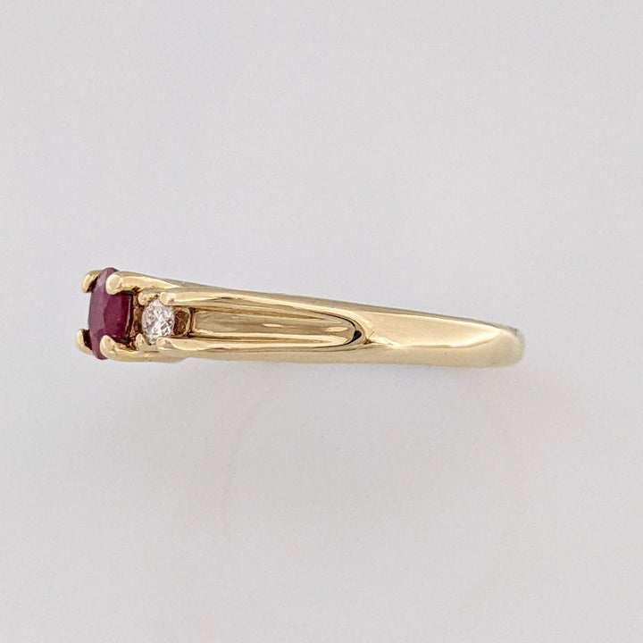 10K RUBY OVAL 4X6 "C" WITH .10 DIAMOND TOTAL WEIGHT (2) ESTATE RING 2.8 GRAMS