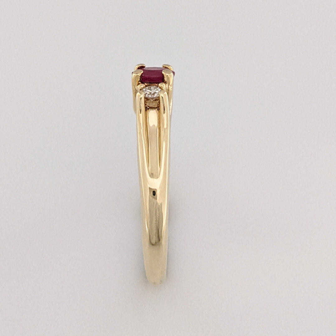 10K RUBY OVAL 4X6 "C" WITH .10 DIAMOND TOTAL WEIGHT (2) ESTATE RING 2.8 GRAMS
