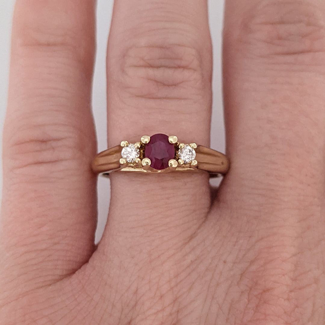 10K RUBY OVAL 4X6 "C" WITH .10 DIAMOND TOTAL WEIGHT (2) ESTATE RING 2.8 GRAMS