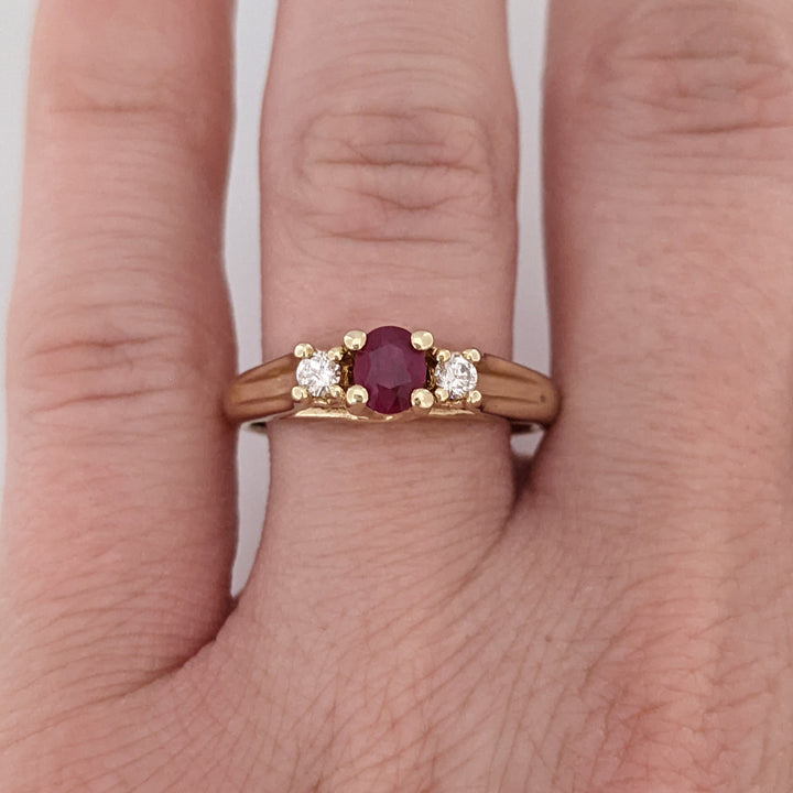 10K RUBY OVAL 4X6 "C" WITH .10 DIAMOND TOTAL WEIGHT (2) ESTATE RING 2.8 GRAMS