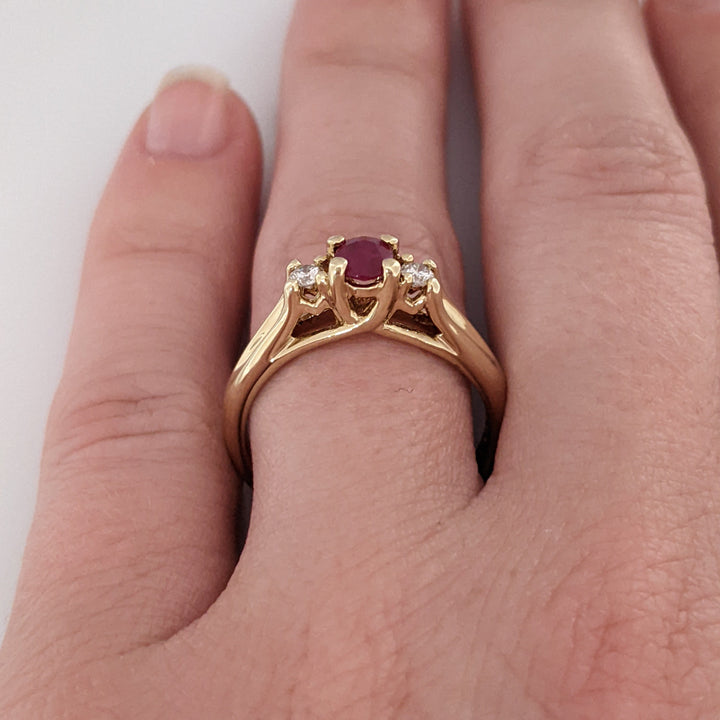 10K RUBY OVAL 4X6 "C" WITH .10 DIAMOND TOTAL WEIGHT (2) ESTATE RING 2.8 GRAMS
