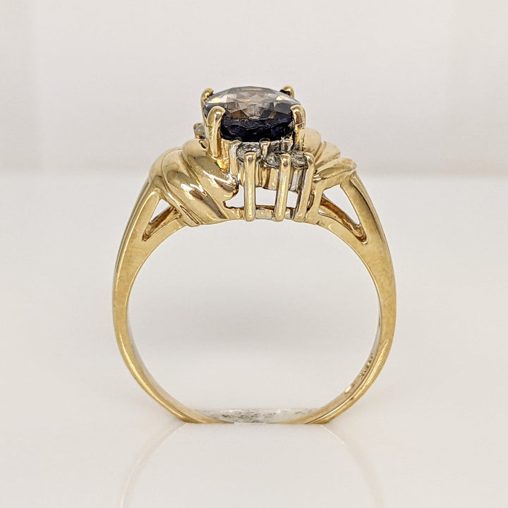 10K IOLITE OVAL 7X9 WITH .10 DIAMOND TOTAL WEIGHT ESTATE RING 4.2 GRAMS