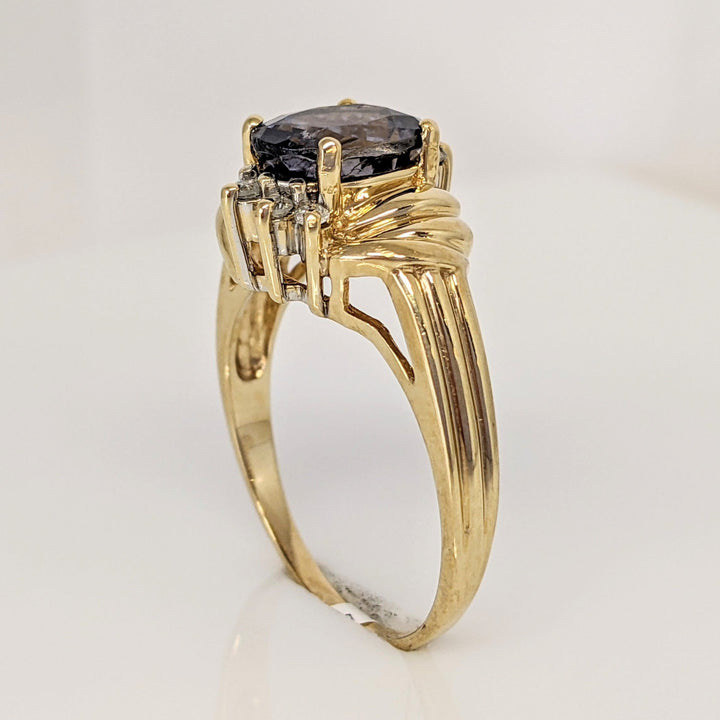 10K IOLITE OVAL 7X9 WITH .10 DIAMOND TOTAL WEIGHT ESTATE RING 4.2 GRAMS