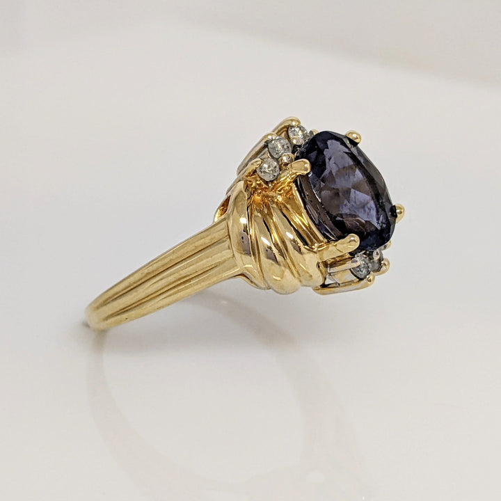 10K IOLITE OVAL 7X9 WITH .10 DIAMOND TOTAL WEIGHT ESTATE RING 4.2 GRAMS