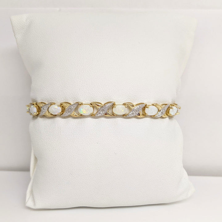 14K OPAL OVAL 4X6 (14) WITH (14) MELEE ESTATE BRACELET 8.7 GRAMS