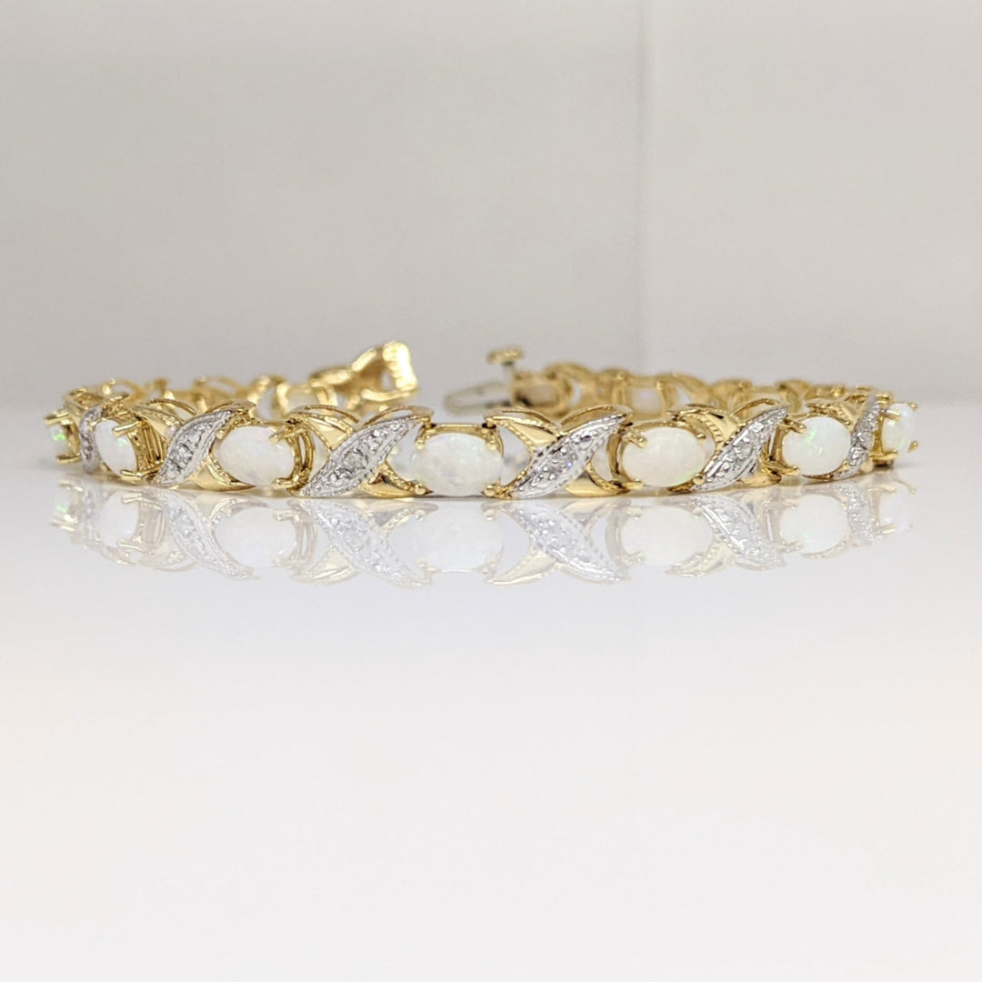 14K OPAL OVAL 4X6 (14) WITH (14) MELEE ESTATE BRACELET 8.7 GRAMS