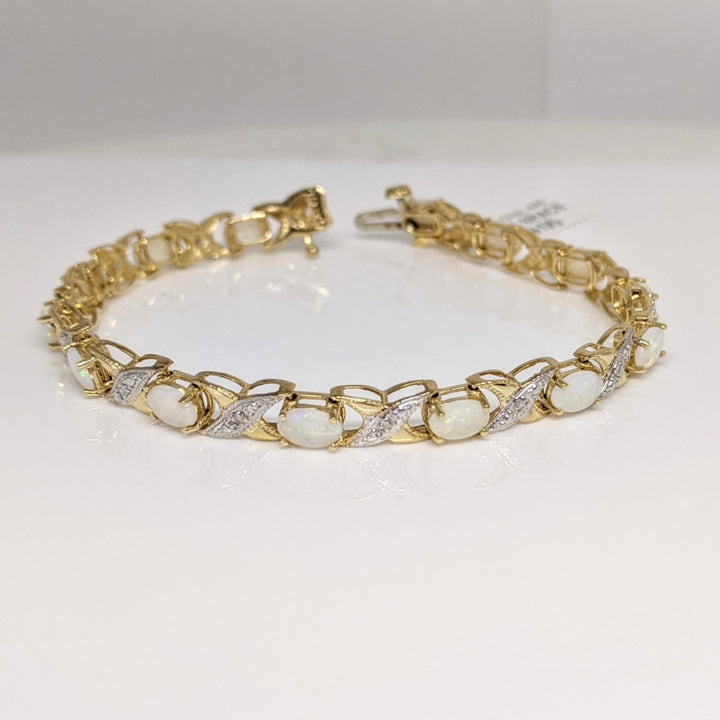 14K OPAL OVAL 4X6 (14) WITH (14) MELEE ESTATE BRACELET 8.7 GRAMS