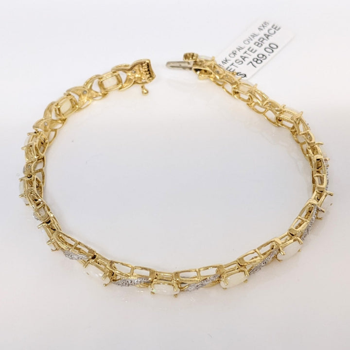 14K OPAL OVAL 4X6 (14) WITH (14) MELEE ESTATE BRACELET 8.7 GRAMS