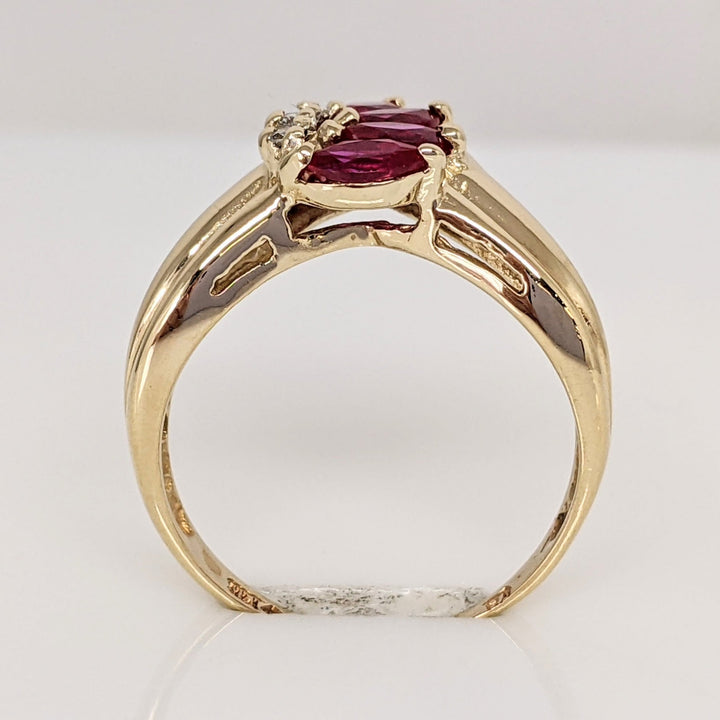 14K RUBY MARQUISE (4) 2.5X4.5 WITH (3) MELEE ESTATE RING 2.9 GRAMS