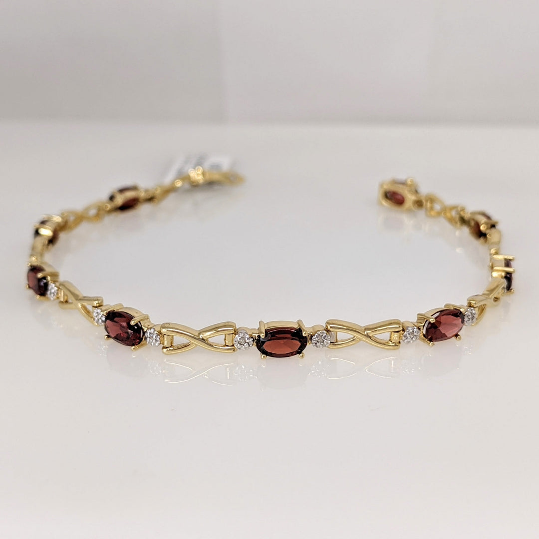 14K GARNET OVAL (9) 4X6 WITH MELEE ESTATE LINK BRACELET 6.2 GRAMS