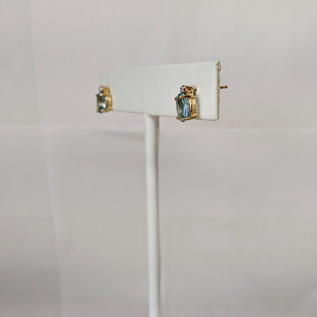 10K BLUE TOPAZ OVAL 5X7 WITH MELEE ESTATE EARRINGS 1.4 GRAMS