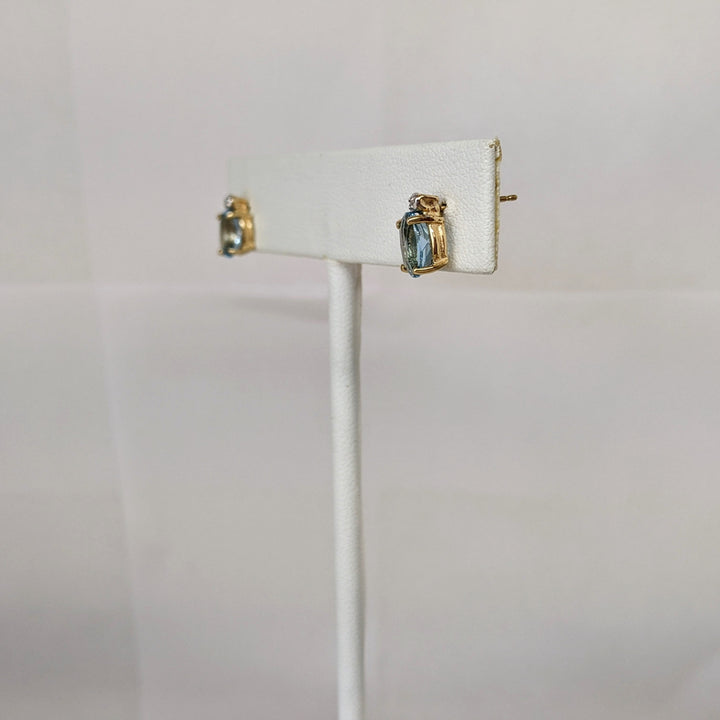 10K BLUE TOPAZ OVAL 5X7 WITH MELEE ESTATE EARRINGS 1.4 GRAMS