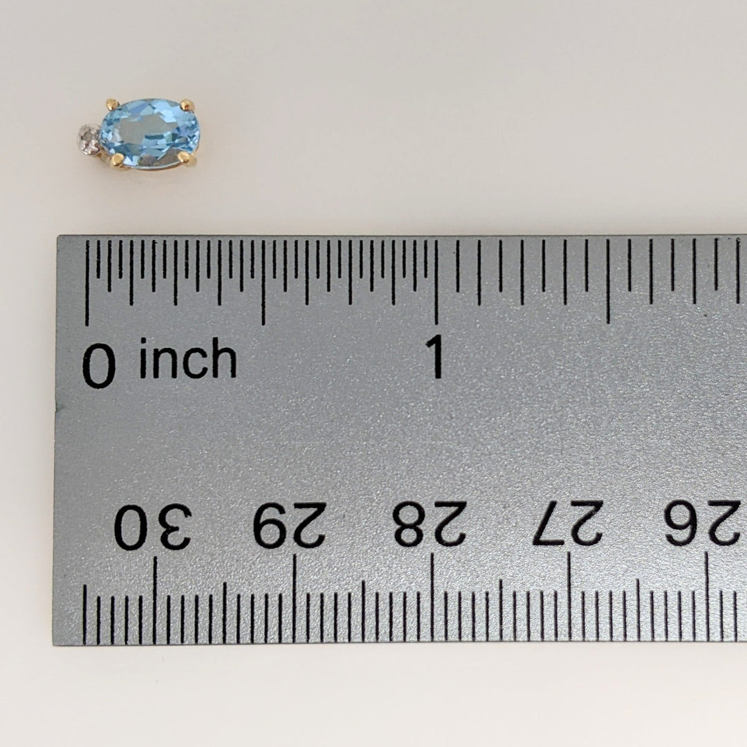10K BLUE TOPAZ OVAL 5X7 WITH MELEE ESTATE EARRINGS 1.4 GRAMS