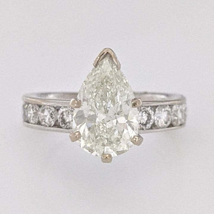 14K WHITE 2.39 CARAT TOTAL WEIGHT I1 K DIAMOND PEAR WITH (10) ROUND CHANNEL DIAMOND ESTATE RING 4.1 GRAMS