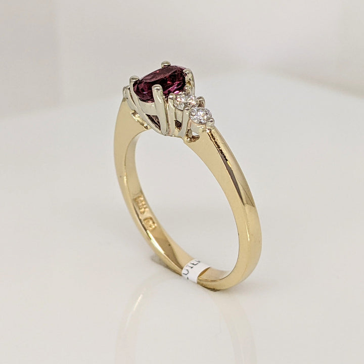14K PINK TOURMALINE OVAL 4X6 WITH .22 DIAMOND TOTAL WEIGHT ESTATE RING 3.6 GRAMS