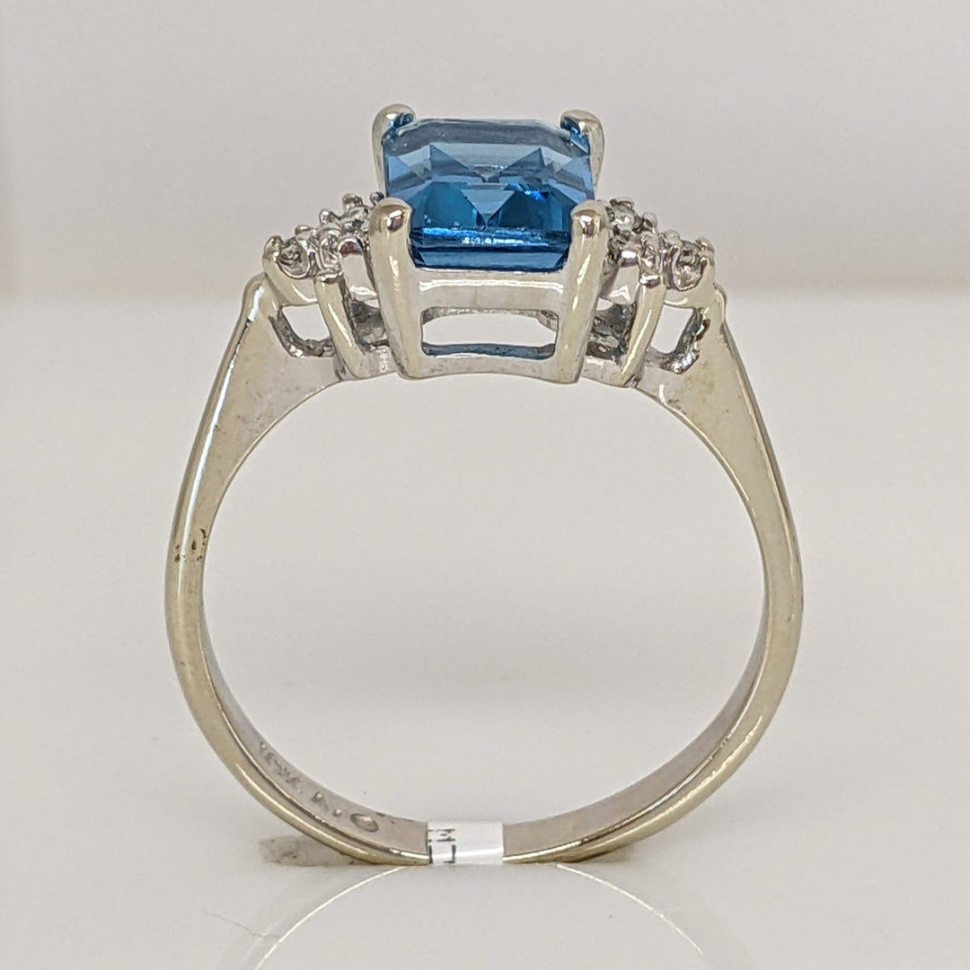 10K WHITE BLUE TOPAZ EMERALD CUT 6X8 WITH (6) MELEE ESTATE RING 2.6 GRAMS